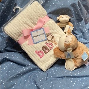 Baby blanket, rattle and teether.